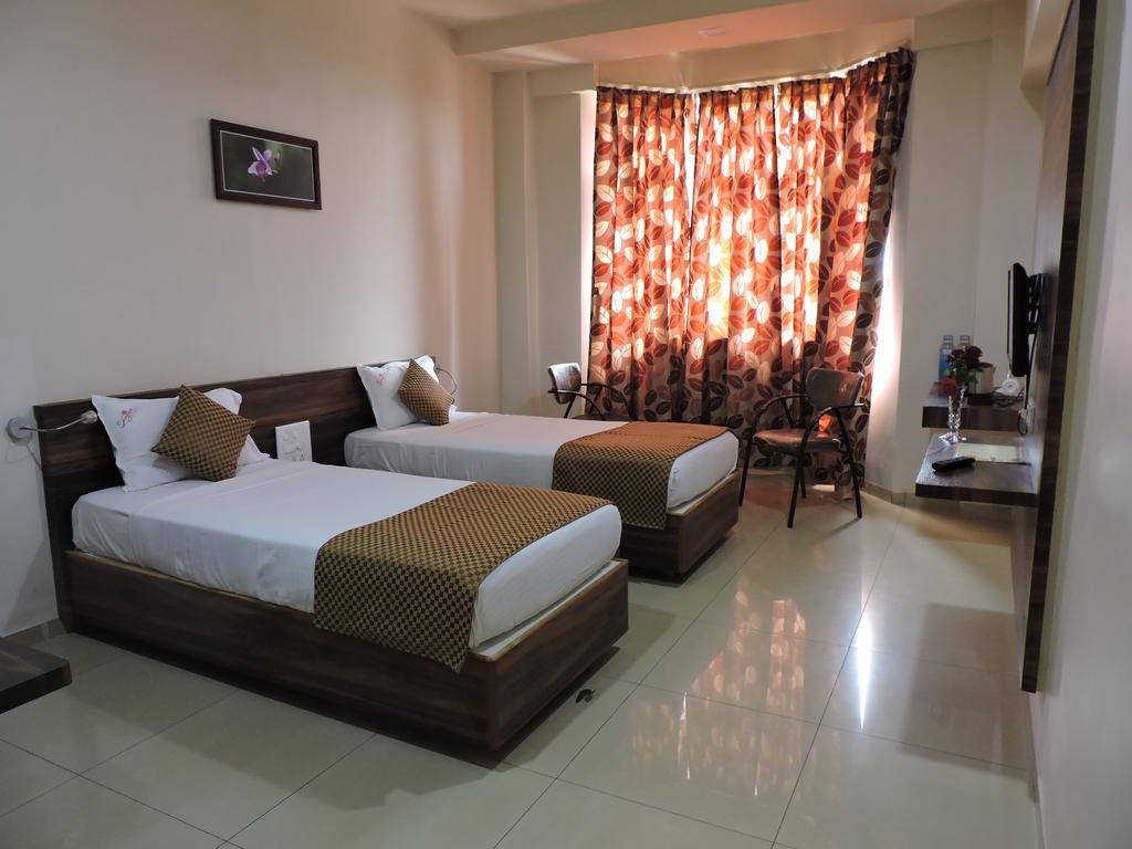 Hotel Sangam Regency Ratnāgiri Oda fotoğraf